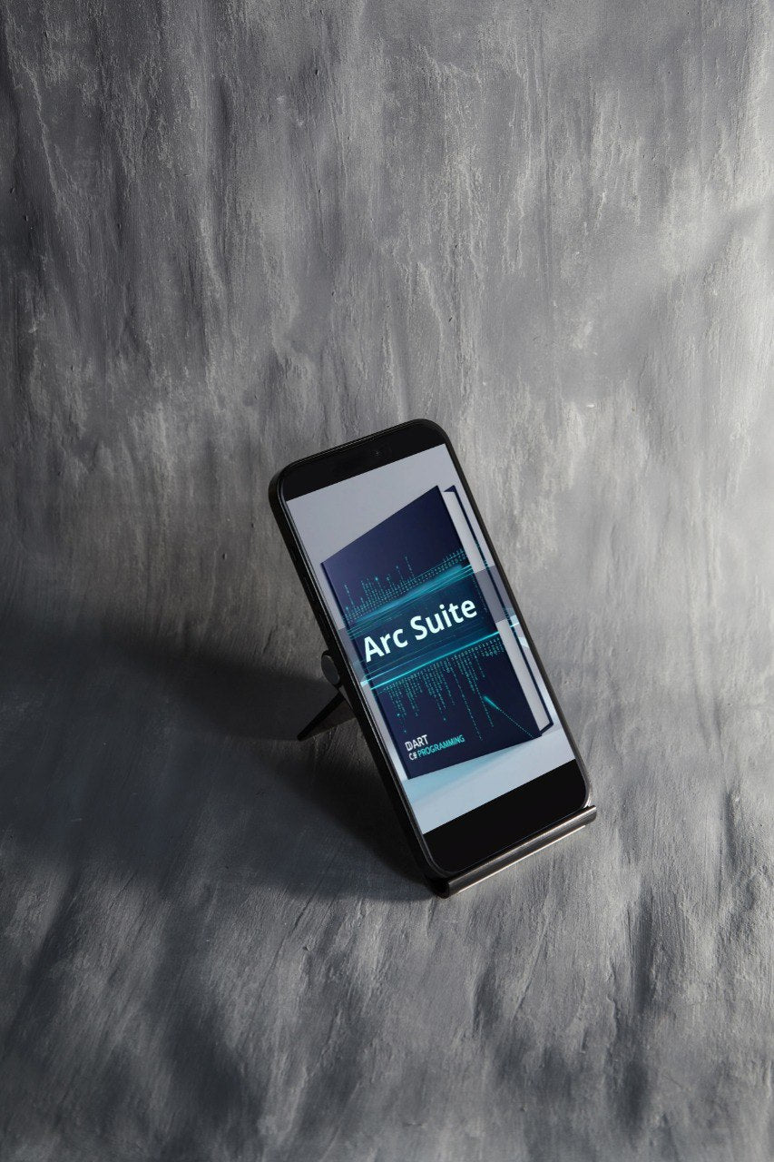 Phone displaying 'Arc Suite' app on a gray textured surface